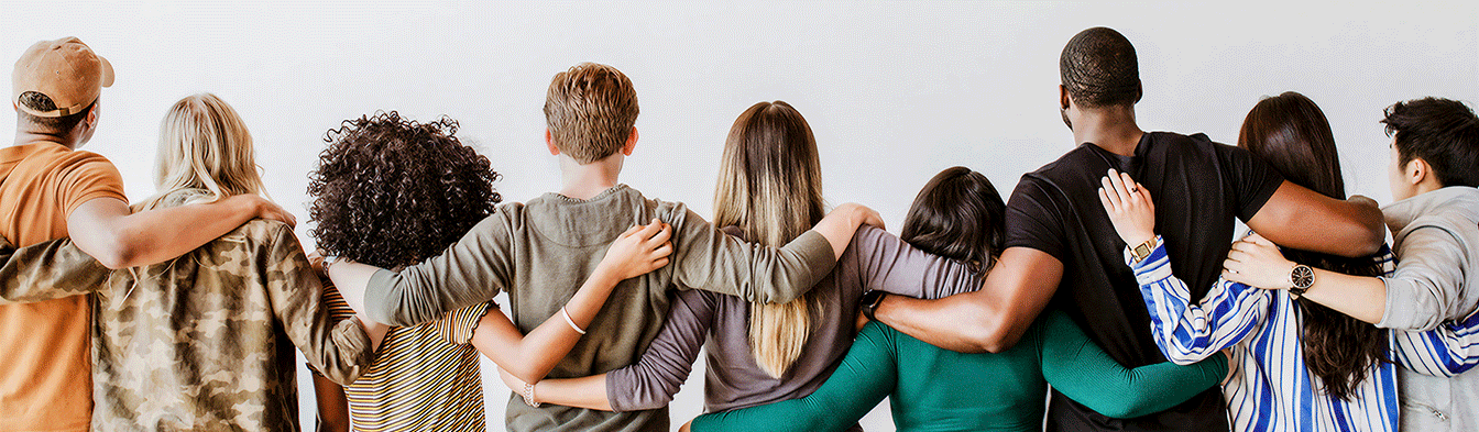 Diverse group with arms interlocked facing away from camera